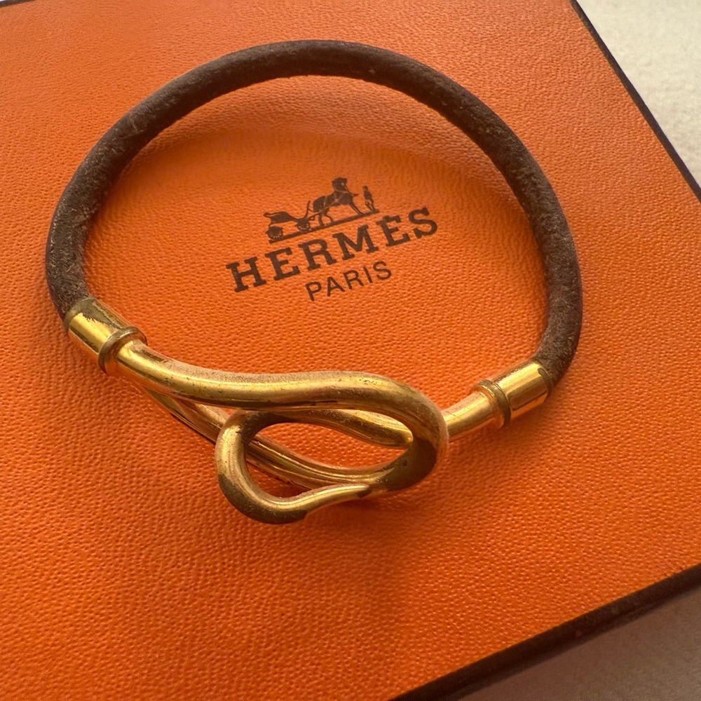 Vintage Hermes leather and metal clasp bracelet. See photos for wear.